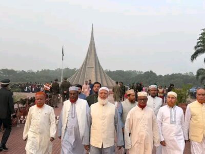 শহিদের রক্তের ওপর দাঁড়িয়ে রাজাকারের ফুল দেওয়ার অভিনয়, বাংলাদেশের জন্য চরম লজ্জার